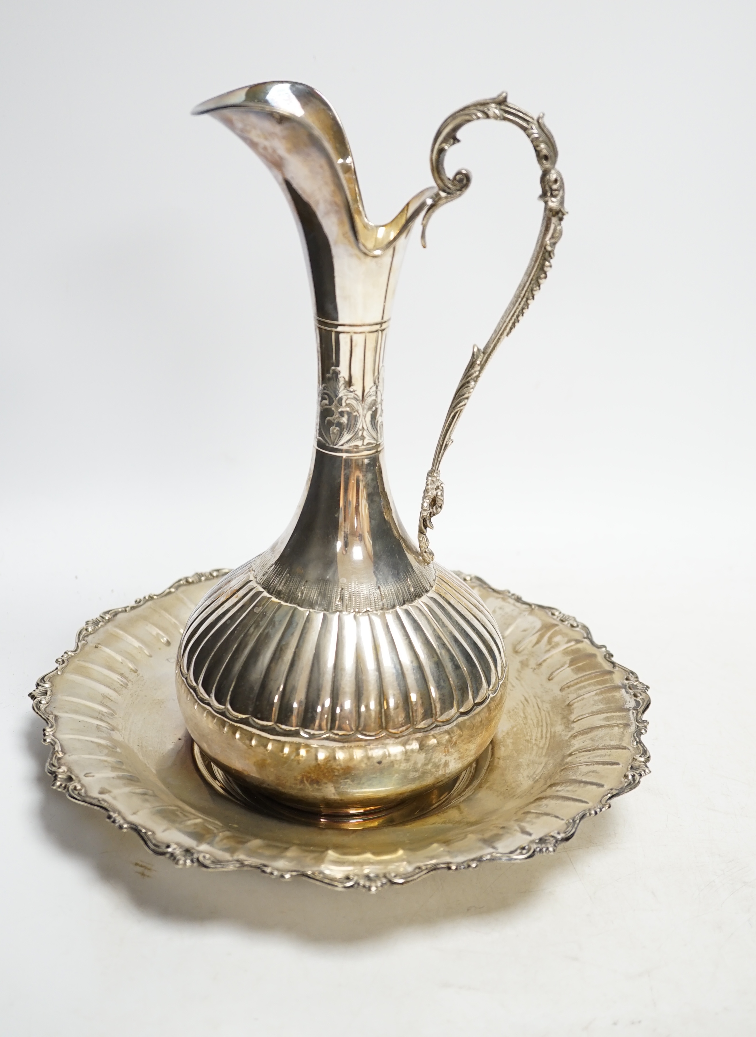 A modern Italian 800 standard white metal ewer, 27.5cm, together with a similar stand, 23.1oz. Condition - fair to good